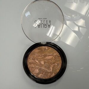 Laura Geller baked balance n glow illuminating foundation powder tan